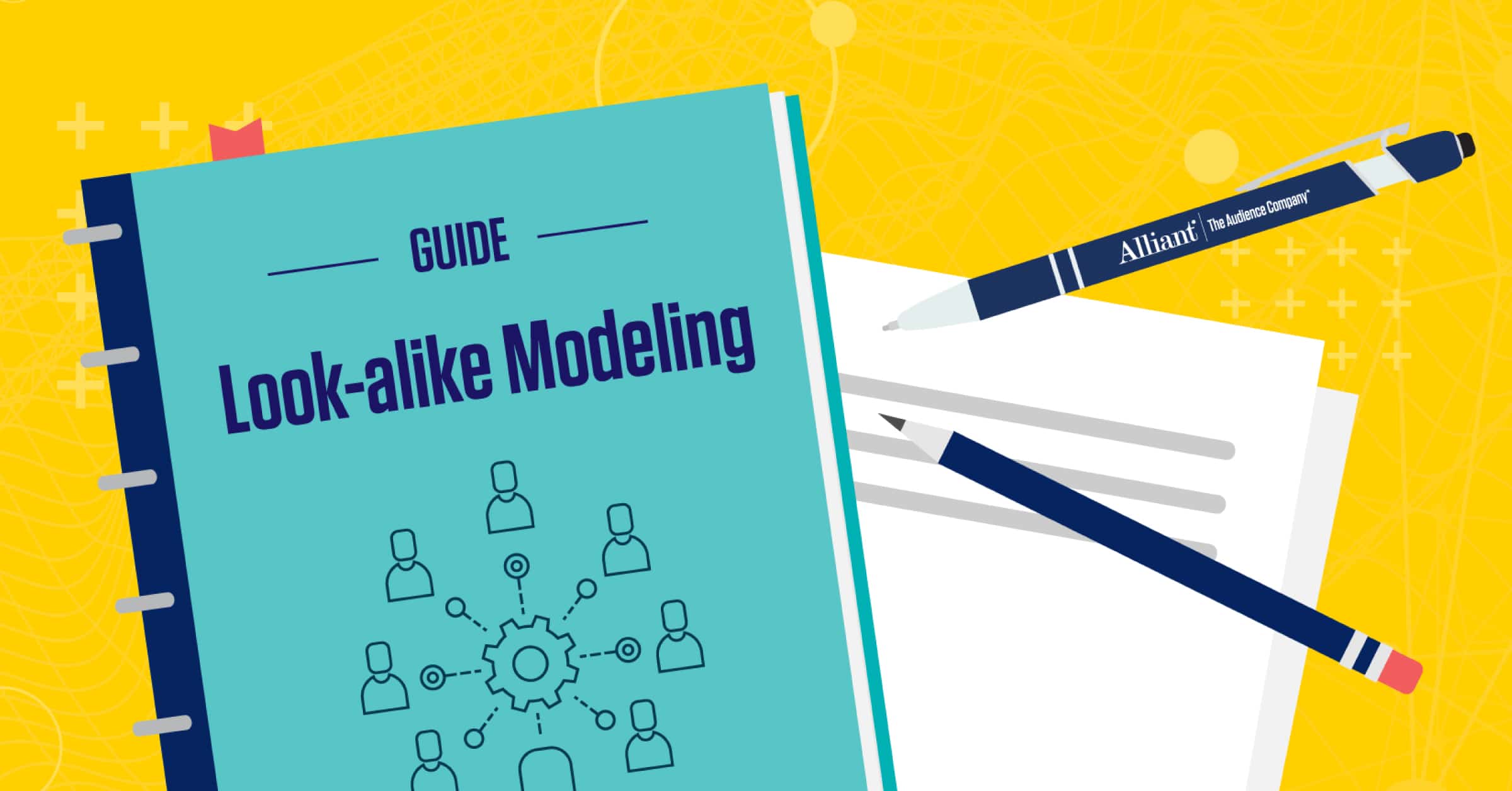 A Look-alike Modeling Guide on a notebook with pens